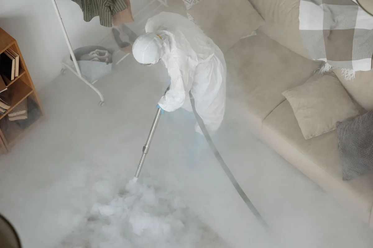 Biohazard cleanup technician in protective equipment, Old Tappan, NJ